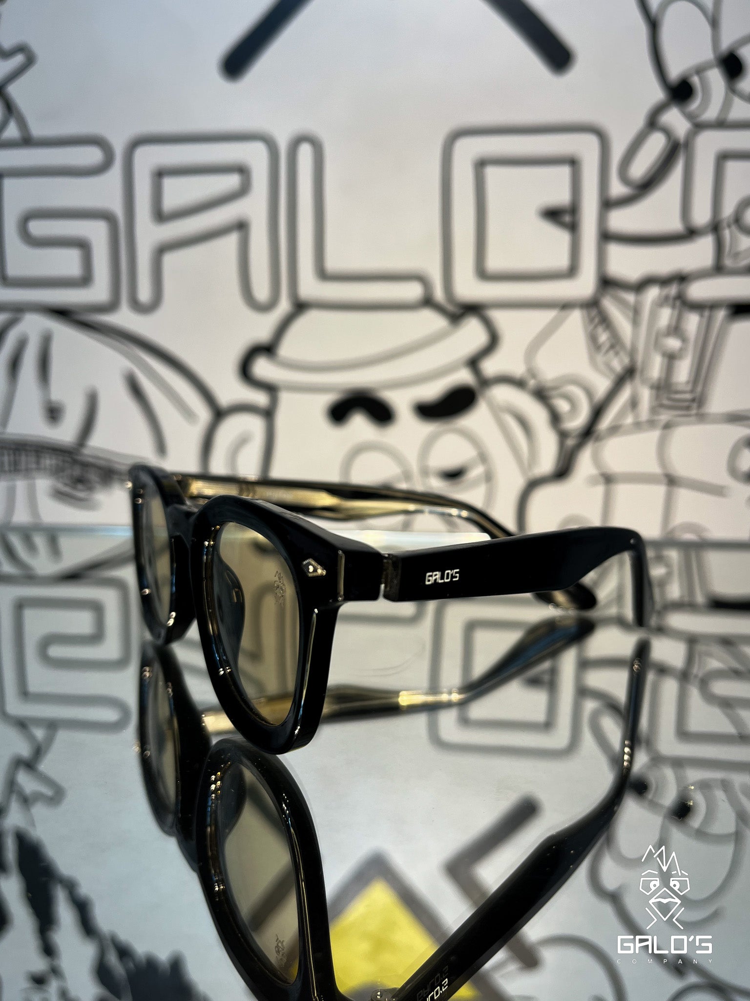 ÓCUROS VISON PRETO LENTE CHAMPANHE